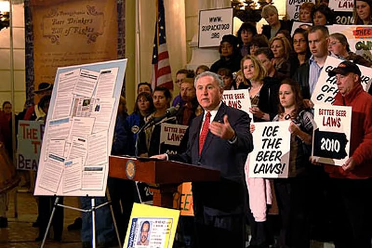Backed by a crowd made up mostly of Sheetz employees who were being paid to be on hand, State Sen. John Rafferty, R-Montgomery County, speaks out about legislation he plans to introduce that will allow supermarkets and convenience stores to sell beer during a state Capitol Rotunda event sponsored by the Pennsylvania Food Merchants Association and the Pennsylvania Convenience Store Council, Tuesday Feb. 16, 2010. (AP Photo/The Patriot-News, Chris A. Courogen)