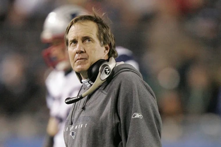 New England Patriots coach Bill Belichick looks up at the scoreboard during the first quarter of Super Bowl XXXIX against the Philadelphia Eagles in Jacksonville, Fla., on Feb. 6, 2005.