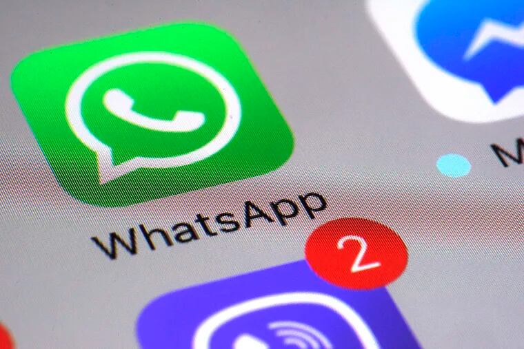 FILE - This Friday, March 10, 2017, file photo shows the WhatsApp communications app on a smartphone, in New York. WhatsApp says a vulnerability in the popular communications app let mobile phones be infected with sophisticated spyware with a missed in-app call alone.