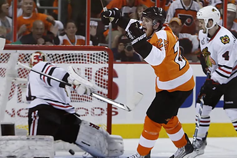 The Flyers' Matt Carle celebrates his goal during the first period of Game 4. (Ron Cortes / Staff Photographer)