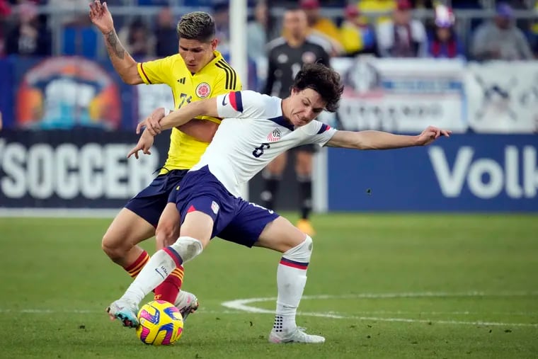Paxten Aaronson (right) playing against Colombia.