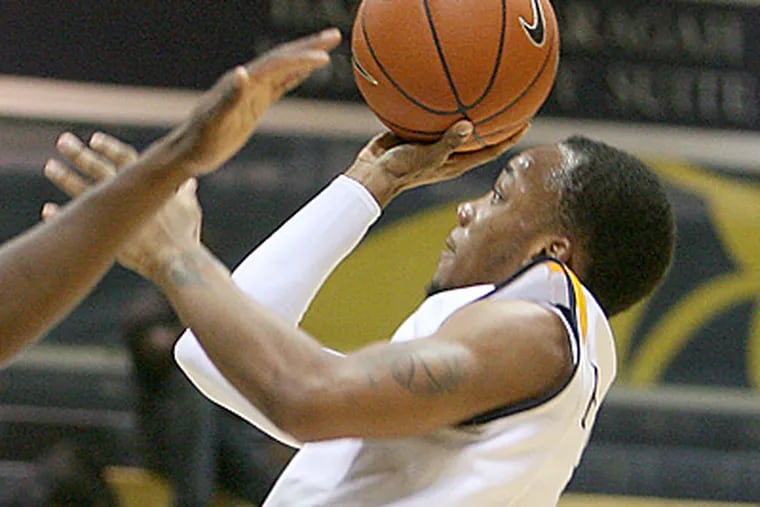 Drexel's Chris Fouch drives to the basket in the first half against Binghamton. (Charles Fox/Staff Photographer)