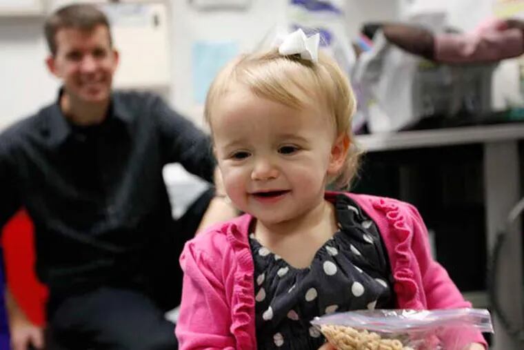 Natalie Grace Van Wyk , 20 months old, enjoys life as a happy toddler at Children's Hospital of Philadelphia. Her parents came from Minnesota for treatment there - and it has been a resounding success. MICHAEL S. WIRTZ / Staff Photographer