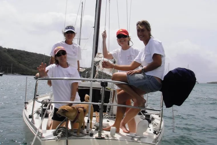 Former Philly reporter Margie Smith Holt (second from right, in red hat) with the St. John women who taught her to sail.