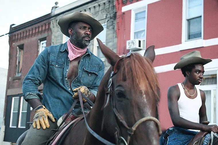 Idris Elba (left) and Caleb McLaughlin in Ricky Staub's "Concrete Cowboy."