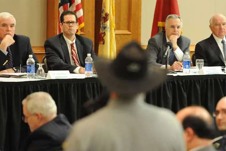 NJ SAFE task force listens to audience member at Rutgers-Camden meeting. (Clem Murray / Staff Photographer)