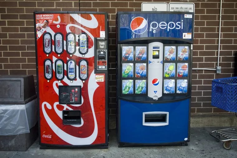 Pepsi-Cola and Coca-Cola vending machines side by side. (Richard B. Levine/Sipa USA/TNS)