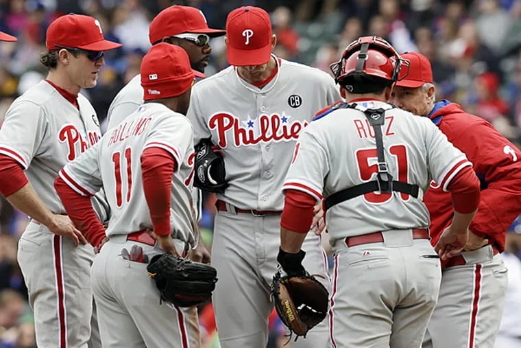 Phillies starting pitcher A.J. Burnett allowed eight runs, seven earned, in 5 2/3 innings against the Cubs in Chicago on Sunday, April 6, 2014. (Nam Y. Huh/AP)