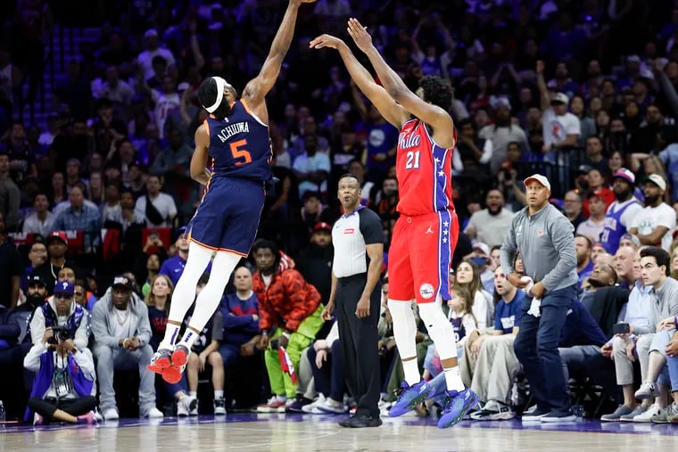 Sixers center Joel Embiid has his three-point attempt blocked by the Knicks' Precious Achiuwa in the fourth quarter of Game 4.