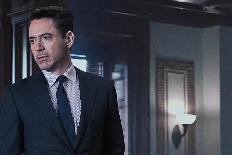 This photo released by Warner Bros. pictures shows, Robert Downey Jr., left, as Hank Palmer and Billy Bob Thornton, right, as Dwight Dickham in Warner Bros. Pictures' and Village Roadshow Pictures' drama "The Judge," a Warner Bros. Pictures release. The movie releases in the U.S. on Friday, Oct. 10, 2014. (AP Photo/Warner Bros. Pictures, Claire Folger)