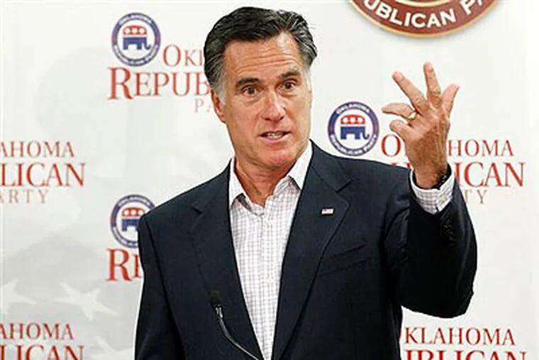 Republican presidential candidate Mitt Romney, gestures as he speaks to supporters at Oklahoma state Republican Party Headquarters in Oklahoma City, Wednesday, May 9, 2012. (AP Photo / Sue Ogrocki)