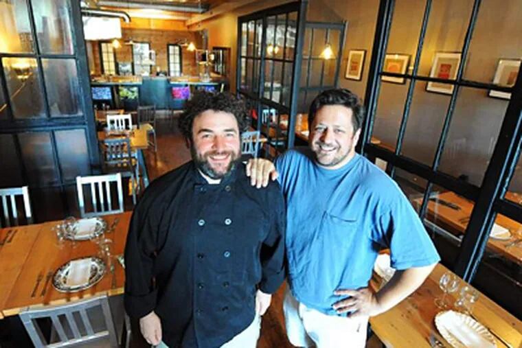 Chef Sam Jacobson (left) and owner Stephen Wagner have opened NoBL, on Lansdowne Avenue-- a block north of Baltimore Avenue. It has a variety of seating arrangements under 20-foot ceilings.