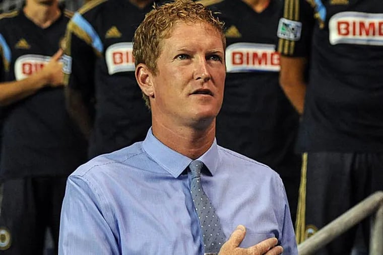 Philadelphia Union interim coach Jim Curtin (left) during the National Anthem at the of the match against the San Jose Earthquakes at PPL Park. (John Geliebter/USA Today)