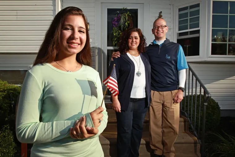Samantha Jones (left), mother Michele, and father Frank are part of a lawsuit over the Pledge of Allegiance.