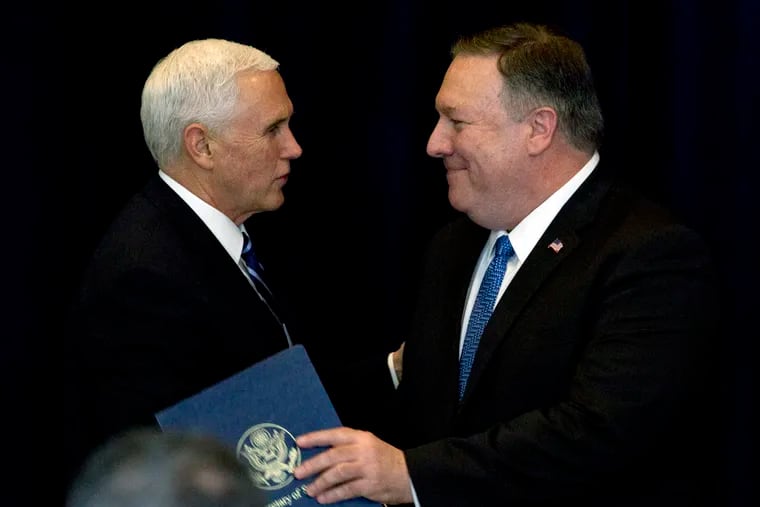 Secretary of State Mike Pompeo greets Vice President Mike Pence at the Global Chiefs of Mission Conference "One Team, One Mission, One Future" at Department of State on Wednesday, Jan. 16, 2019, in Washington. (AP Photo/Jose Luis Magana)