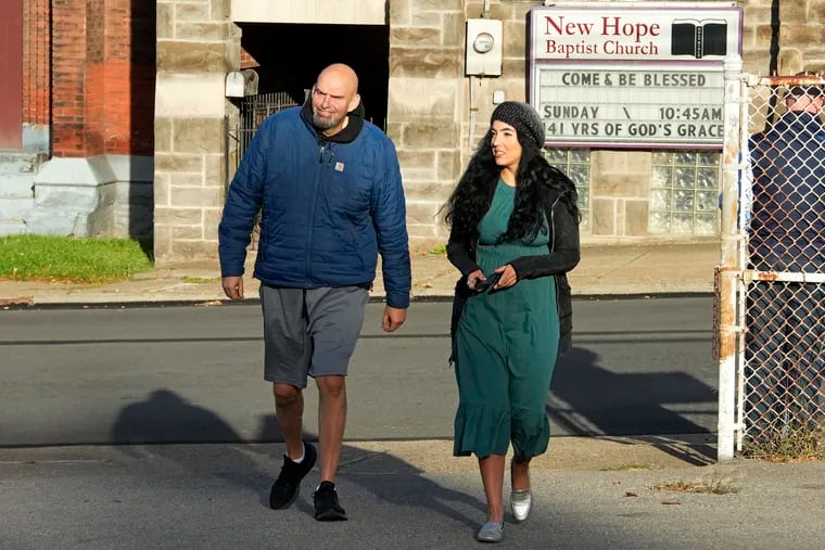 Senator-elect John Fetterman rocked his standard 'fit of shorts and Skechers on an outing with his wife, Gisele, in Braddock, Pa. in November.