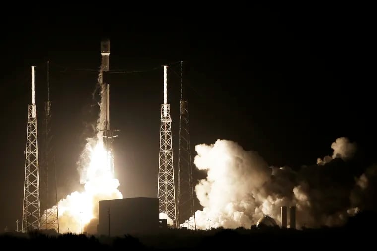 A SpaceX Falcon 9 rocket lifts off with Israel's Lunar Lander and an Indonesian communications satellite at space launch complex 40, Thursday, Feb. 21, 2019, in Cape Canaveral, Fla. An Israeli spacecraft blasted off to the moon in an attempt to make the country’s first lunar landing, following a launch Thursday night by SpaceX.