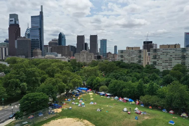 The homeless encampment at 22nd St. and the Benjamin Franklin Parkway was scheduled to be cleared out on Friday, but city officials postponed that decision on Thursday. Mayor Jim Kenney said he will meet with camp organizers next week to listen to their demands for housing for those who are homeless.