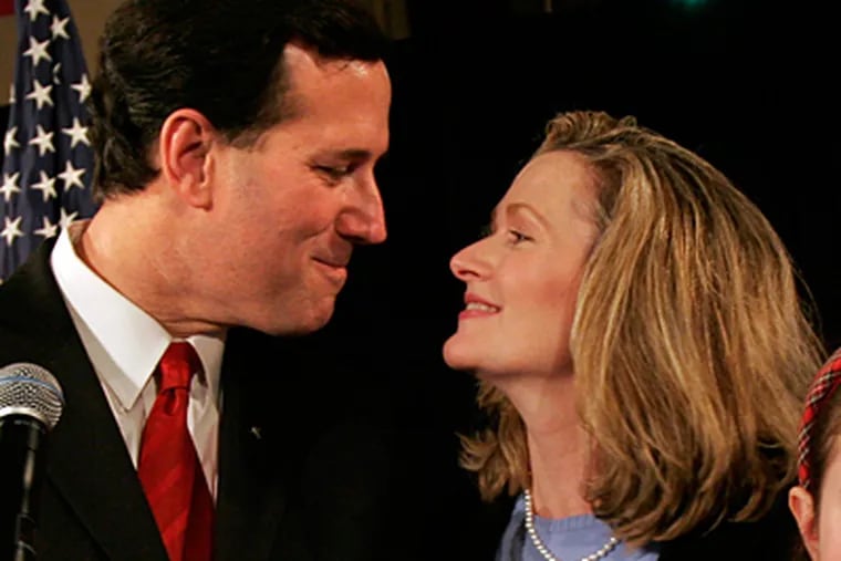 Rick Santorum kisses his wife, Karen, during his 2006 concession speech. (Eric Mencher / Staff Photographer)