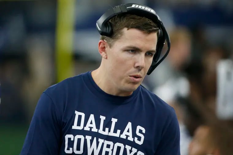Dallas Cowboys offensive coordinator Kellen Moore talks with players on the sideline in the second half of a NFL football game against the New York Giants in Arlington, Texas, Sunday, Sept. 8, 2019. (AP Photo/Ron Jenkins)