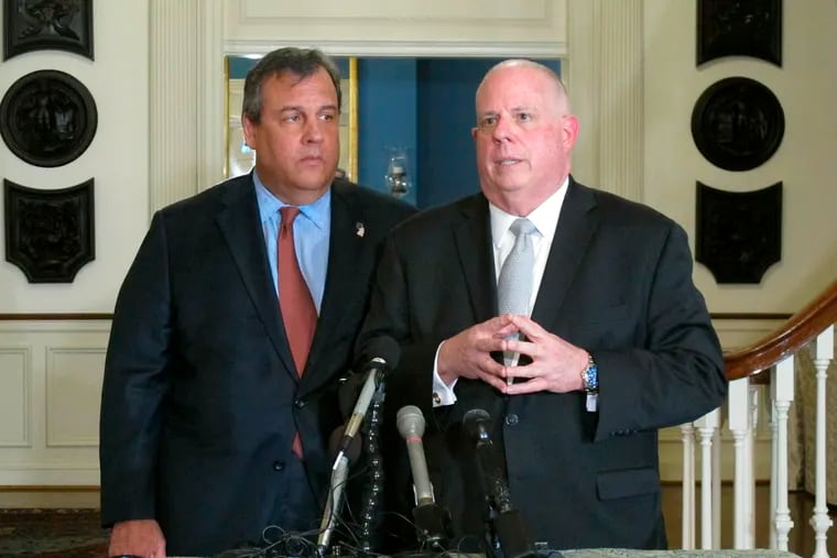 Maryland Gov. Larry Hogan, right, talks to reporters with former New Jersey Gov. Chris Christie, left, on Thursday, March 21, 2019 at the governor's residence in Annapolis, Md. Hogan, who still isn't entirely ruling out a potential primary challenge to President Donald Trump because it's unclear what the future holds, said that currently "it doesn't make any sense at all." Christie says he doesn't see a political path at the moment for challenging Trump, because of the president's approval ratings among Republicans. (AP Photo/Brian Witte)