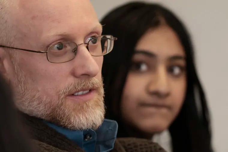 Seth Holm describes the current lack of opportunities for women in Afghanistan as Afghan Education Student Outreach Project  (AESOP) member senior Anvitha Paruchuri listens during an AESOP meeting at the Hun School in Princeton, N.J. on Thurs. Feb. 02, 2023.