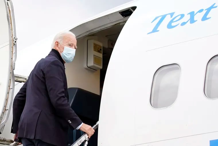Democratic presidential candidate former Vice President Joe Biden boards his campaign plane in Michigan on Friday, Oct. 2, 2020.