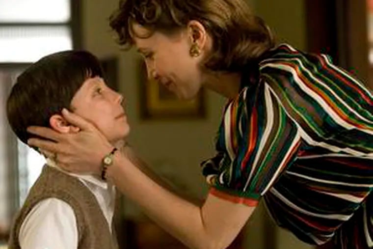 Asa Butterfield and Vera Farmiga as son and mother, living near a Nazi death camp with an SS father, in &quot;The Boy in the Striped Pajamas.&quot;