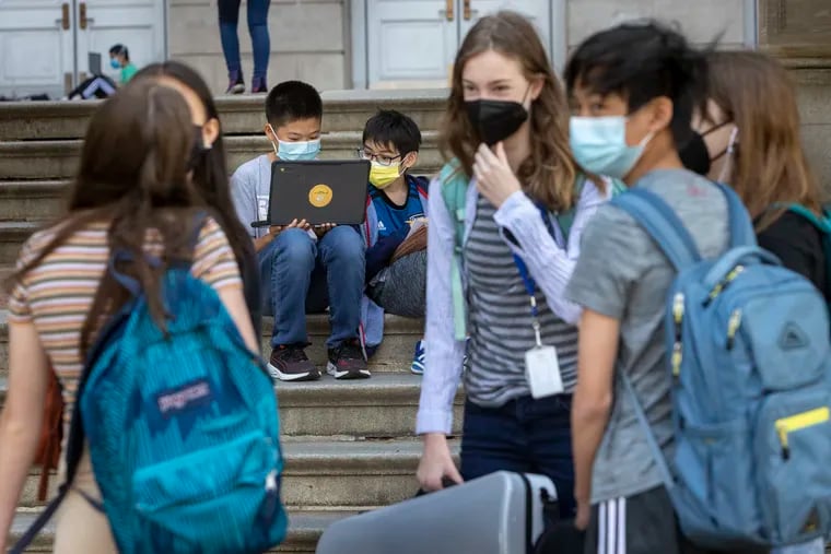 Students outside Masterman wear masks in this May file photo. The Commonwealth Court last week dismissed a challenge to school districts' authority to require masking.
