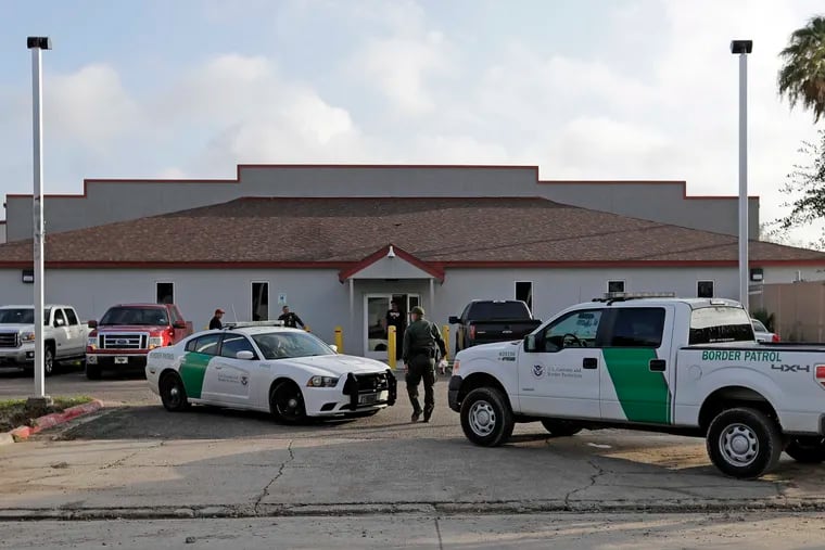 FILE - In this Saturday, June 23, 2018, file photo, a U.S. Border Patrol Agent walks between vehicles outside the Central Processing Center in McAllen, Texas. Advocates were shocked to find an underage mom and her tiny, premature newborn daughter huddled in a Border Patrol facility the second week of June 2019, in what they say was another example of the poor treatment immigrant families receive after crossing the border. The mother is a Guatemalan teen who crossed the border without a parent and was held at a facility in McAllen, Texas, with other families with children. (AP Photo/David J. Phillip, File)