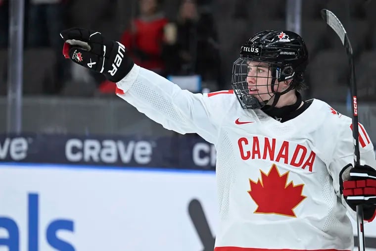 Boston University's Macklin Celebrini celebrates after he scored a goal for Canada against Latvia in the World Junior Championship on Dec. 27, 2023. Celebrini is expected to be selected first in the NHL draft.