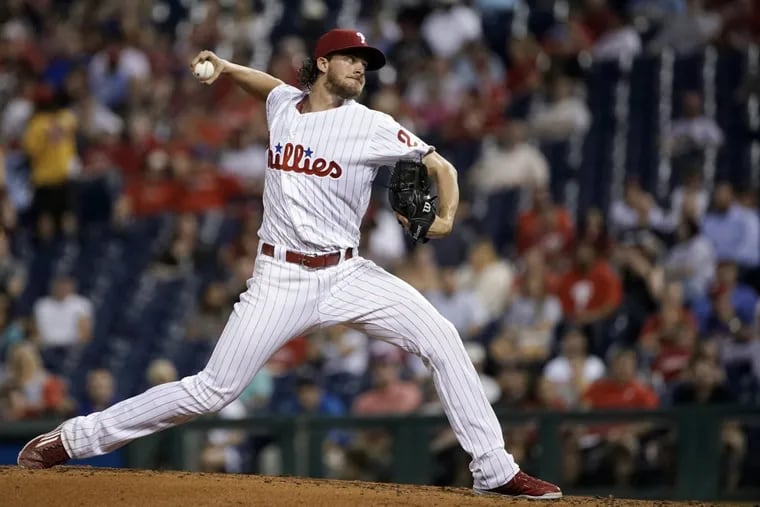 The Phillies’ Aaron Nola throws a pitch during the third inning against the Nationals on Monday night.