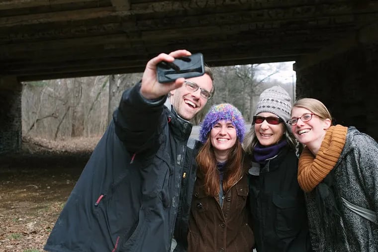 Artists (from left) Jean-Jacques Tiziou, Sam Wend, Ann de Forest, and Adrienne Mackey stop to take a
selfie before completing their adventure around Philadelphia.
