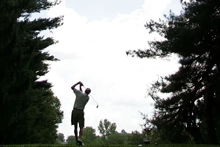 Paul Rogowicz tees off on the 8th hole during the semifinals of the 106th Philadelphia Amateur Championship at Torresdale-Frankford Golf Club in Philadelphia on June 15, 2006. (Barbara L. Johnston/Inquirer)