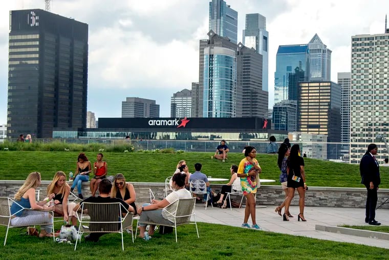 In this file photo from July. guests on the rooftop at Cira Green overlook the Center City skyline. Philadelphia ranked 53rd in the world in terms of its overall attractiveness to Generation Z.