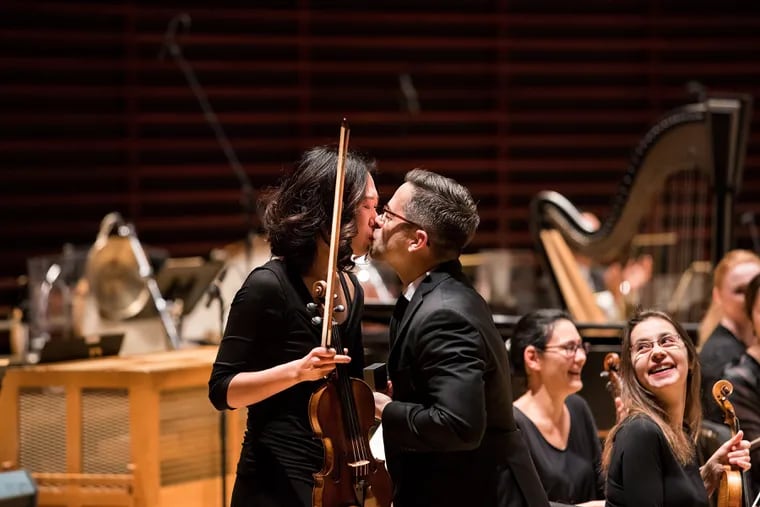 Trumpet player Tony Prisk proposes to violinist Julia Li on stage at a Philadelphia Orchestra concert on Valentine's Day, Feb. 14, 2020.