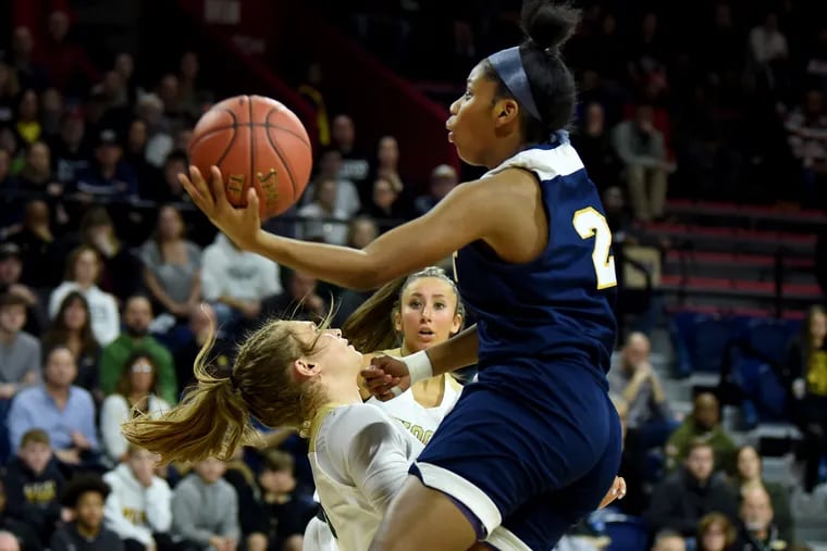 West Catholic's Destiney McPhaul, pictured against Archbishop Wood on Feb. 24, scored her 1,000th career point Friday in a 91-38 rout of Susquenita to open the PIAA Class 3A tournament.
