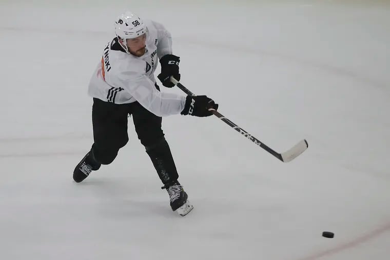 Flyers forward Tanner Laczynski shoots the puck during team development camp drills at the Flyers Skate Zone in Voorhees, New Jersey in 2021.