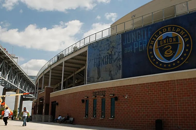 With the Philadelphia Union in their fifth season, PPL Park, in the shadow of the Commodore Barry Bridge, remains an island among vacant land and dilapidated buildings. (Ron Cortes/Staff file photo)