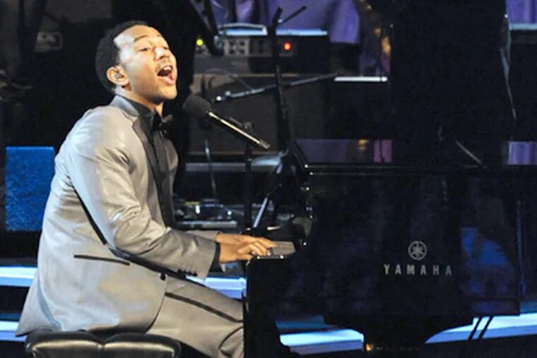 Singer John Legend performs at the CNN Heroes: An All Star Tribute awards show in November. He played the Tower Theatre on Friday night. (AP Photo/Gus Ruelas)