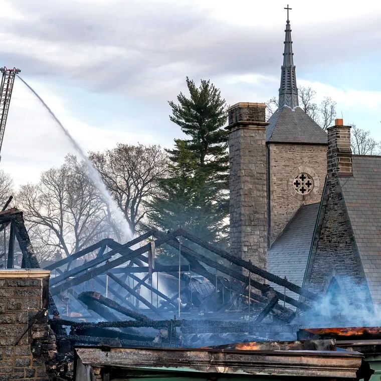 The roof and steeple the Our Mother of Consolation Parish School is destroyed.