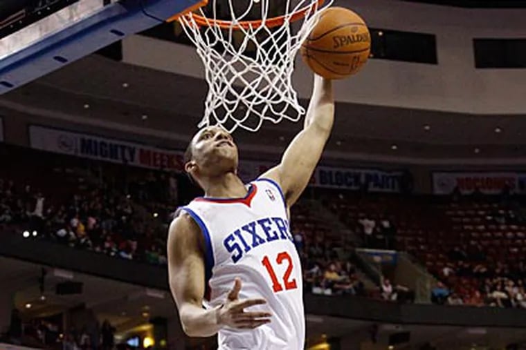 Evan Turner is one of 11 Sixers that are currently under contract. (Matt Slocum/AP)