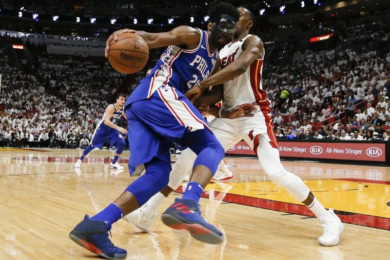 Sixers center Joel Embiid drives on Heat forward Josh Richardson during the Sixers’ Game 3 win on Thursday.