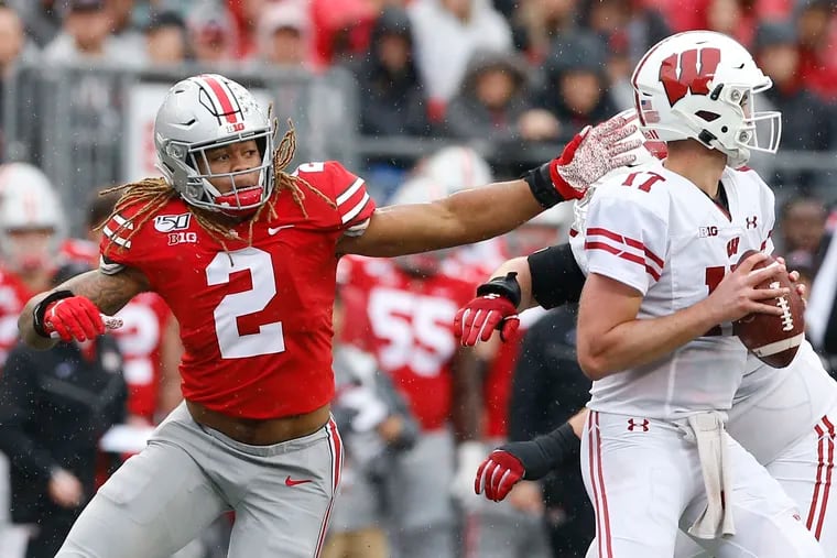 Ohio State defensive end Chase Young pressures Wisconsin quarterback Jack Coan last month.