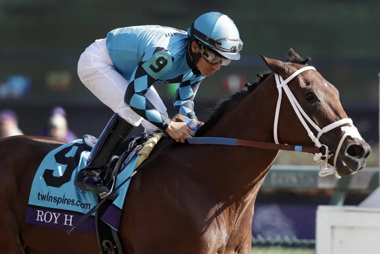 Paco Lopez rides Roy H to victory in the Breeders' Cup Sprint on Saturday.