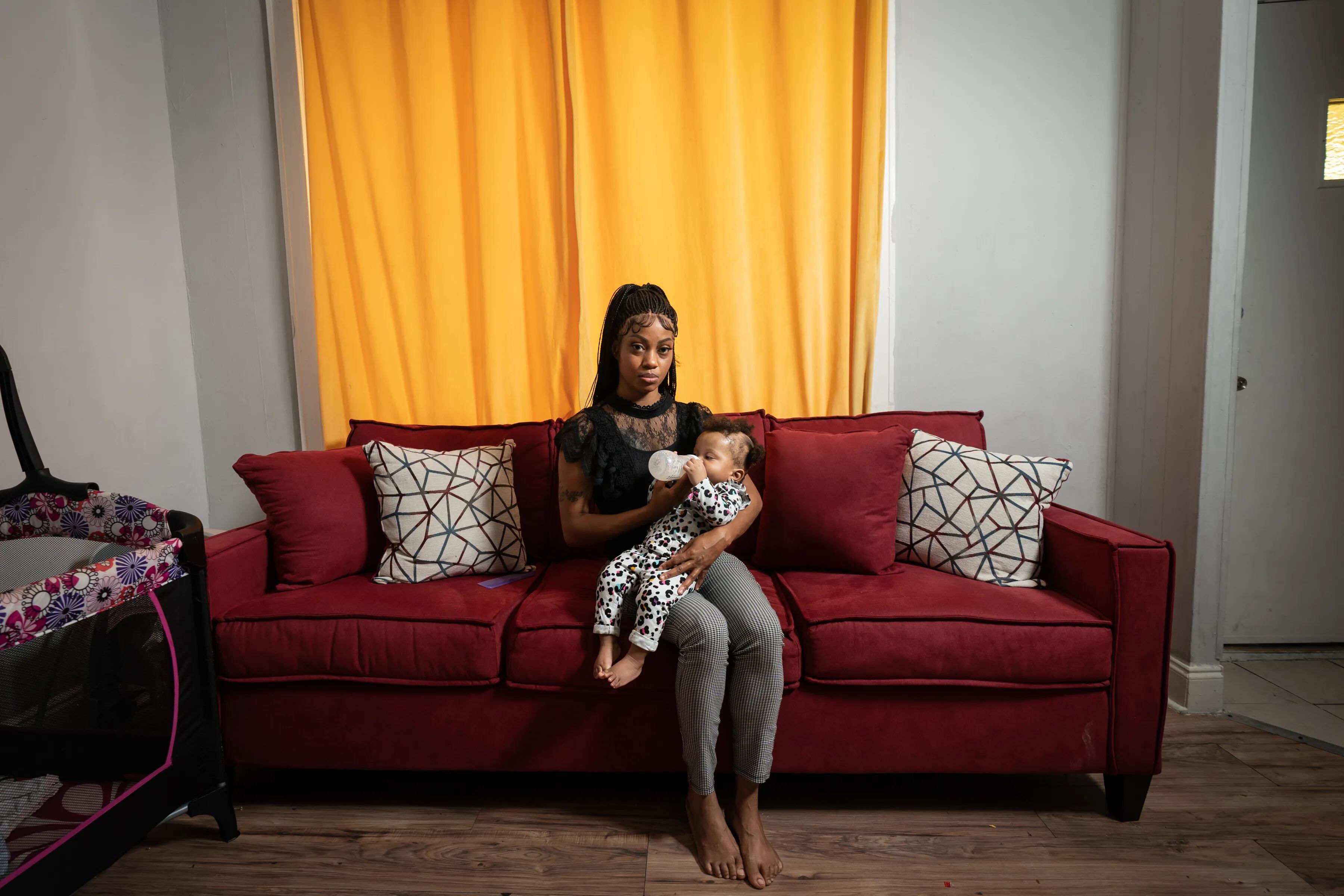 Kendra Outterbridge, a parent of a child who struggled with problems with the city Department of Human Services, with her daughter, Azoni Outterbridge.