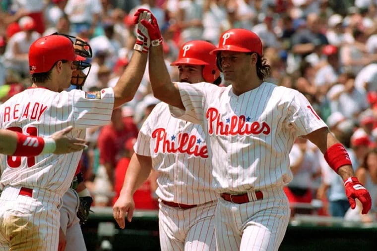 Phillies Wall of Fame catcher Darren Daulton, right, was a 25th-round draft pick in 1980.