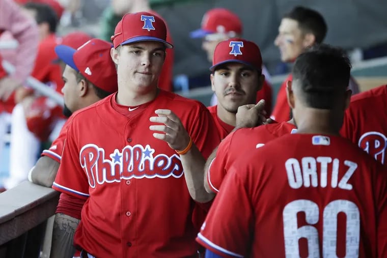 Phillies prospect Mickey Moniak greeting his teammates during a split-squad game in spring training.