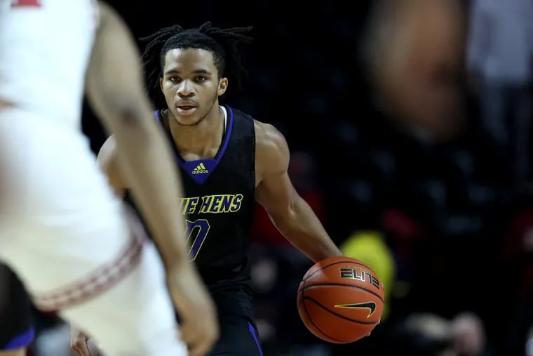 Jameer Nelson, Jr. of Delaware  warms up during the game against Temple at the Liacouras Center on Nov. 27, 2021.