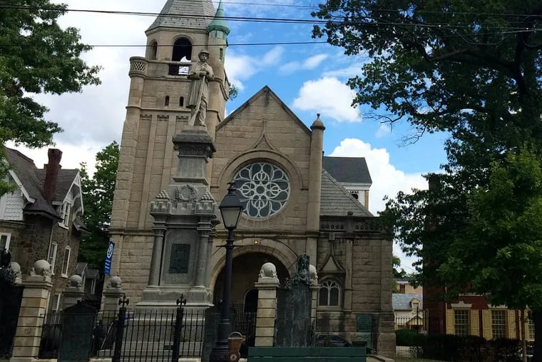 The Victorian church on Market Square in Germantown, designed by George T. Pearson in 1888, is now the Impacting Your World Christian Center. (INGA SAFFRON / Staff)